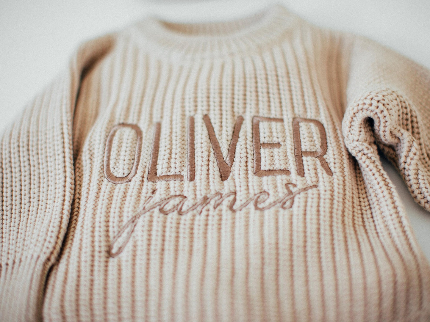 Chunky knit gender neutral oat romper
