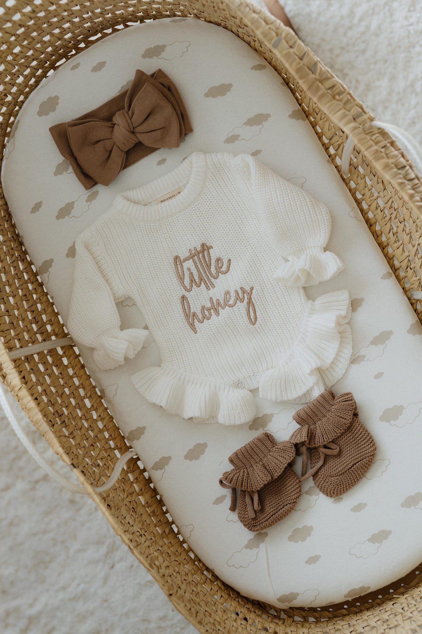 Chunky knit ruffle romper