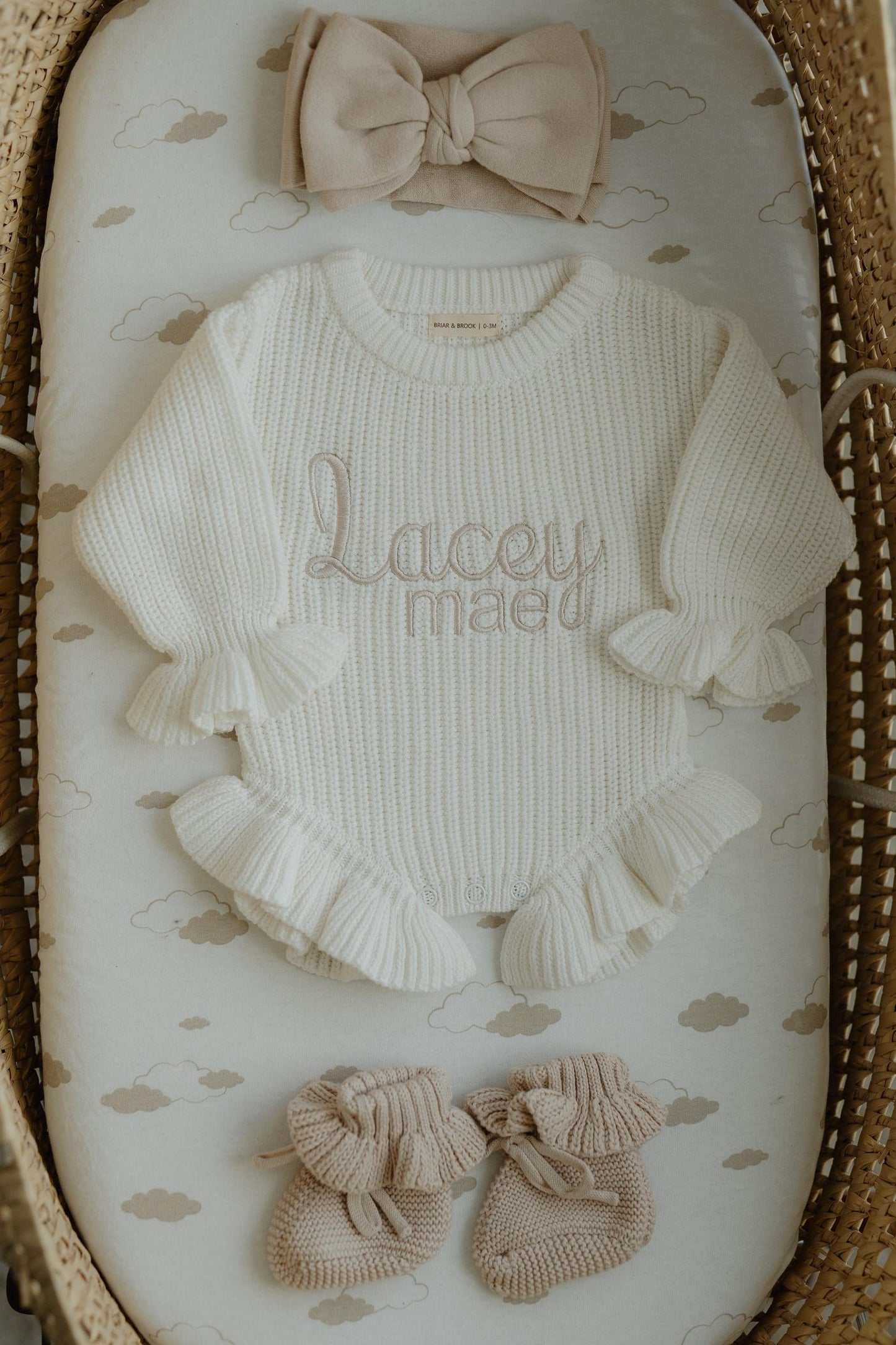 Chunky knit ruffle romper