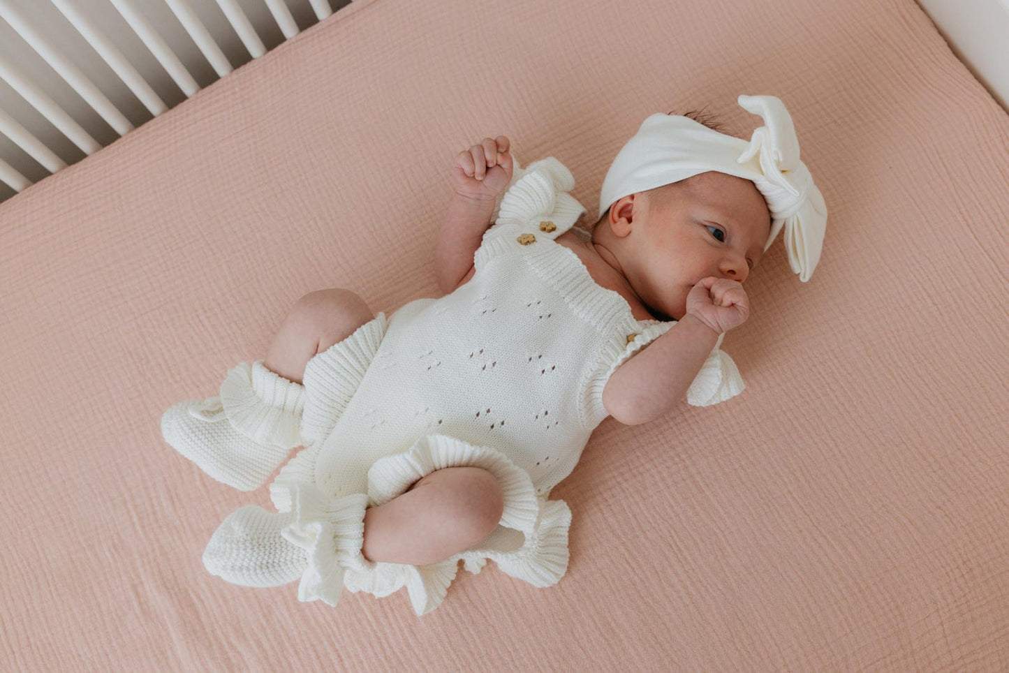 White pointelle ruffle romper